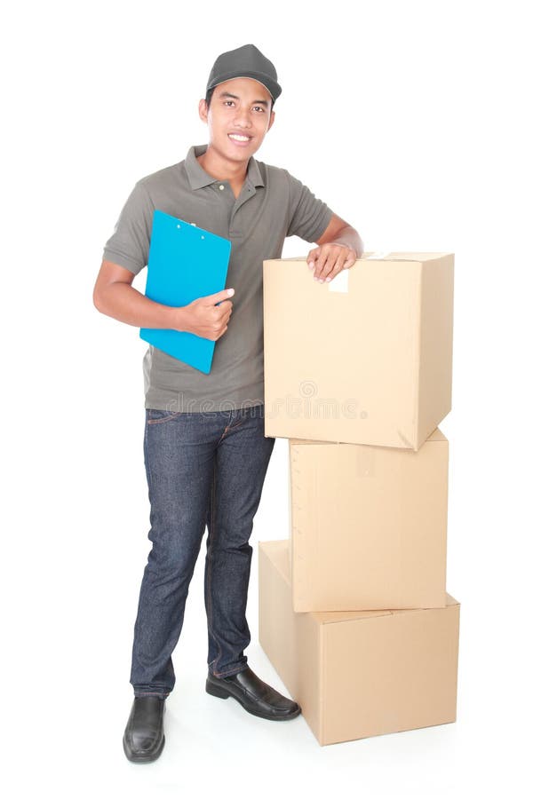 Smiling young delivery man with cardbox package isolated on white background. Smiling young delivery man with cardbox package isolated on white background