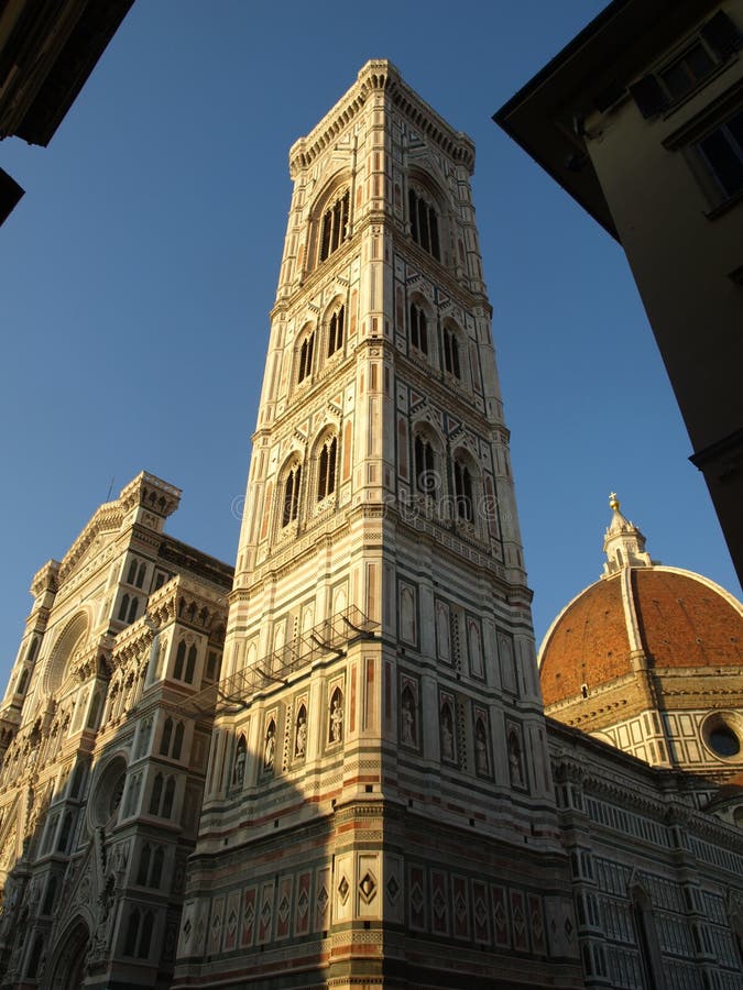 Glimpse of Cathedral, bell tower and couple