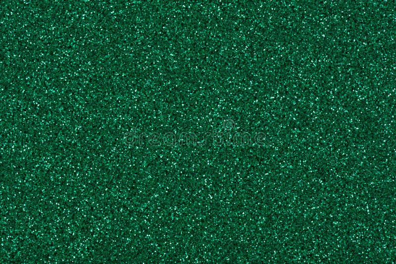 Glitter background in new green tone, shiny texture for your christmas desktop.