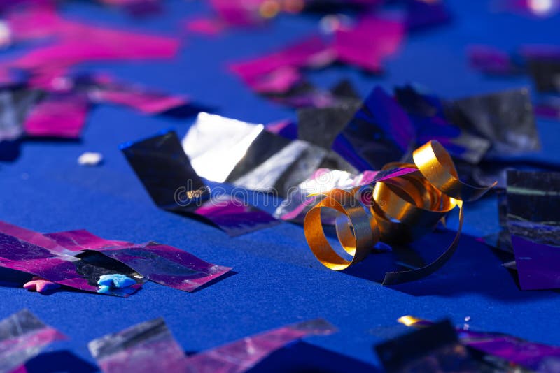 Glitter Confetti Lying On Paper Background Close Up Stock Photo Image