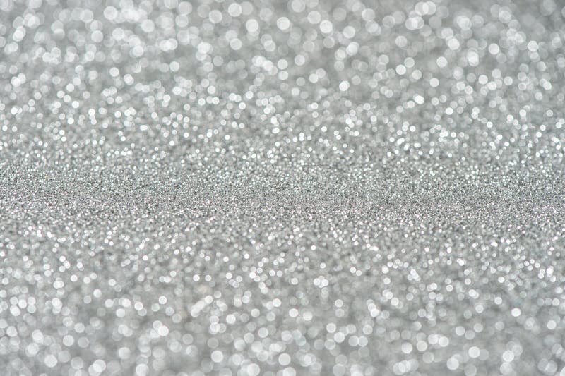 Glitter and Glow. Shiny Silver Background. Abstract Texture Stock Photo