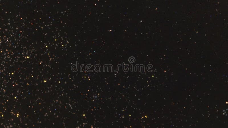 Glitter Particles with Stars. Bokeh Shiny Particles Loop Animation. Green Particles on Black Background. stock footage