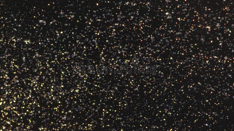 Glitter Particles with Stars. Bokeh Shiny Particles Loop Animation. Green Particles on Black Background. stock footage