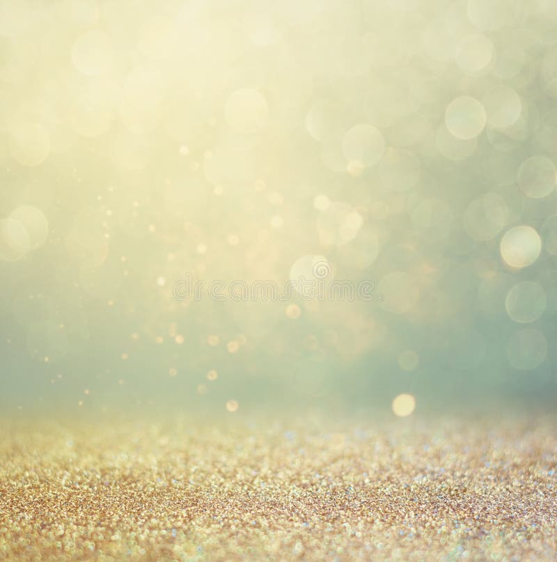 Glitter vintage lights background. gold, silver, blue and black. de-focused. Shimmering gold glitter texture stock images, royalty-free photos and pictures