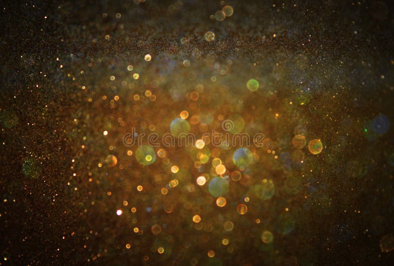 Glitter vintage lights background. light gold and black. defocused. Shimmering gold glitter texture stock images, royalty-free photos and pictures