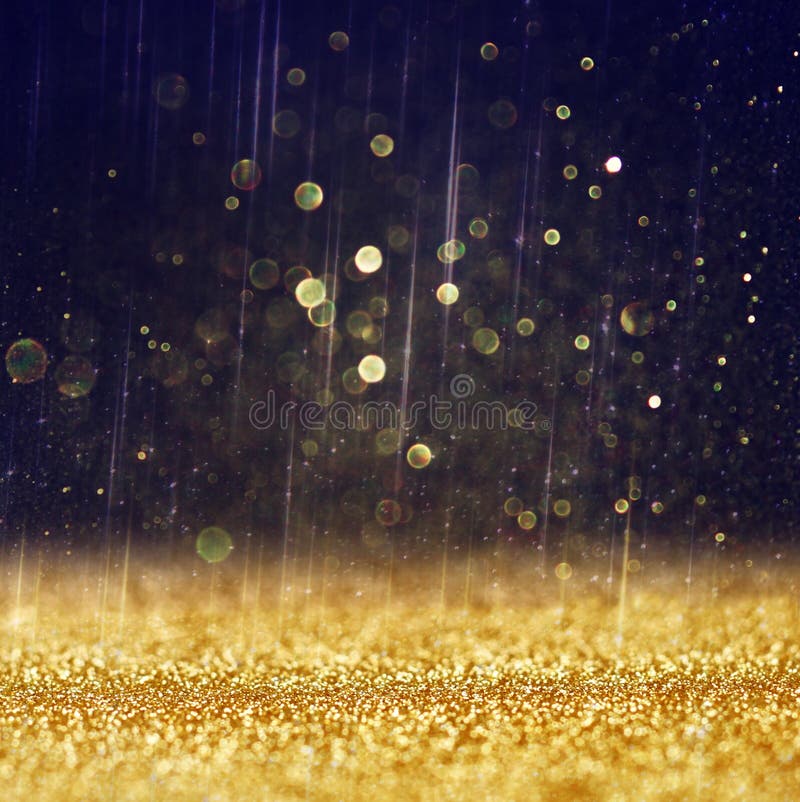 Glitter vintage lights background. light gold and black. defocused. Shimmering gold glitter texture stock images, royalty-free photos and pictures