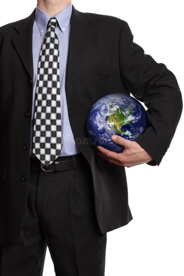 Business man holding a globe in his hand in a soccer ball pose symbol for global business, communications, teamwork or environmental conservation Credit to:. Business man holding a globe in his hand in a soccer ball pose symbol for global business, communications, teamwork or environmental conservation Credit to: