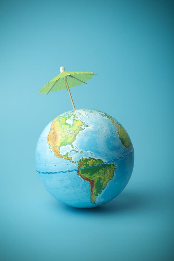 Global Warming and Climate Change on Earth Concept. Earth Globe on a Blue  Background with an Umbrella Stock Image - Image of chimney, disaster:  189632653