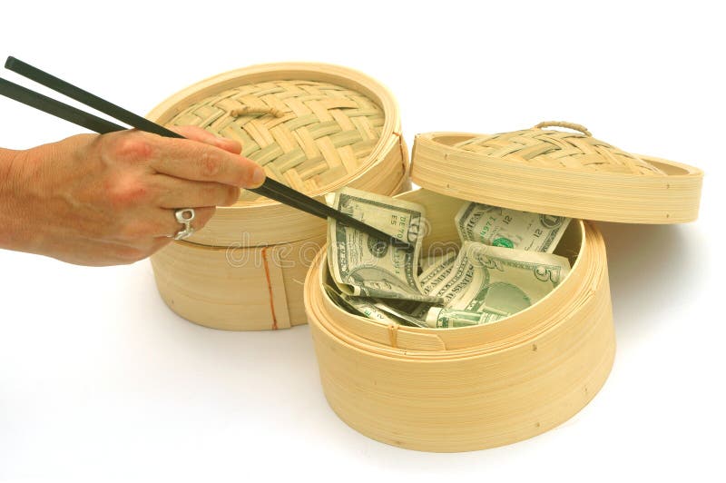 USA o della valuta Americana in un dim sum vapore cestello, si mangia con le bacchette simbolo del commercio internazionale, la globalizzazione, etc.