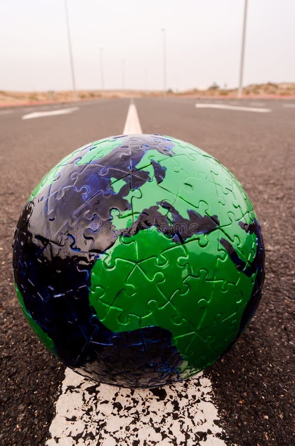 Globe Earth on an Asphalt Street royalty free stock photo