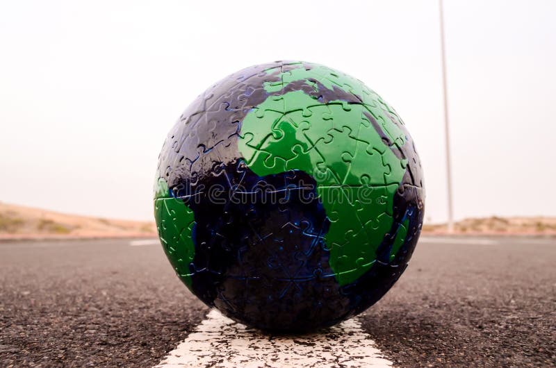 Globe Earth on an Asphalt Street , digital photo image royalty free stock images