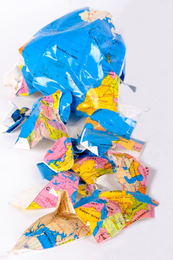 Globo del mondo lacerato nei pezzi immagine stock libera da diritti Globo del mondo lacerato nei pezzi immagine stock libera da diritti