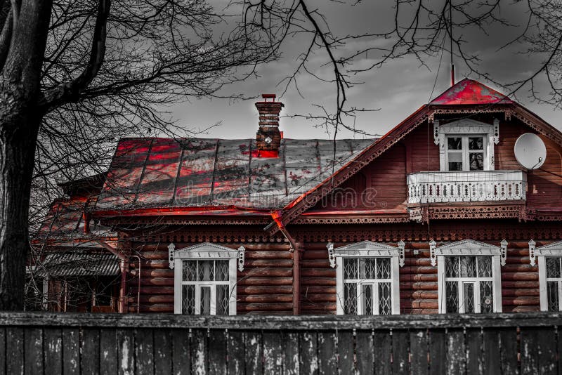 Gloomy old village house on a monochromatic background.. Tinted royalty free stock images Gloomy old village house on a monochromatic background.. Tinted royalty free stock images