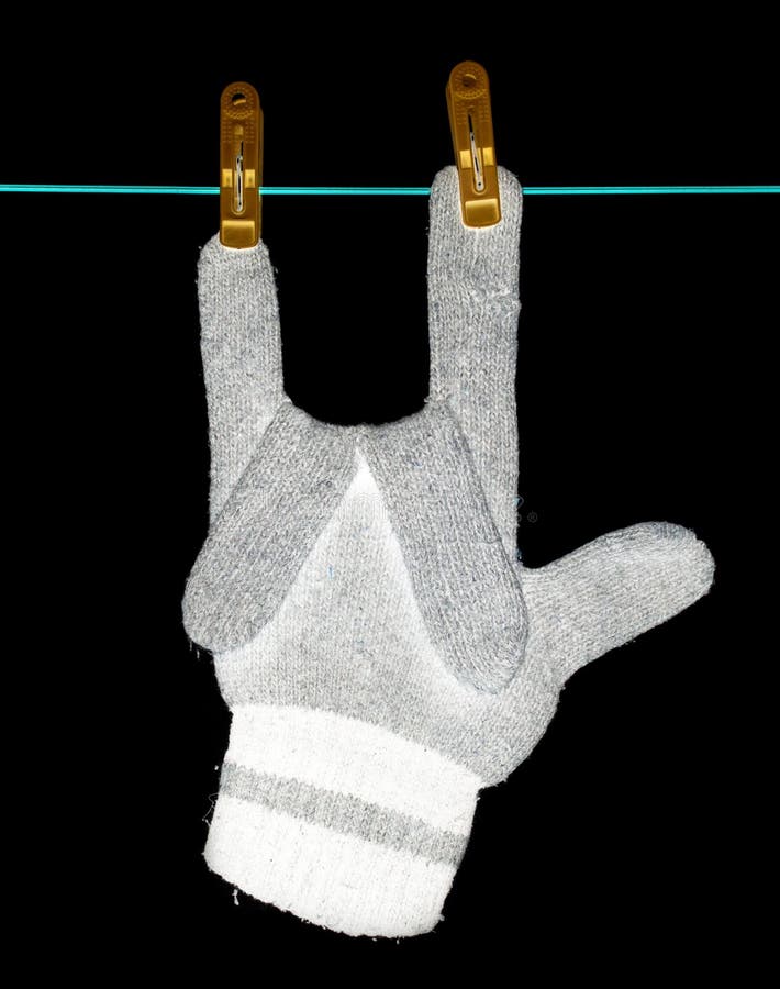 The Glove is Dried on a Rope on a Black Background Stock Image Image