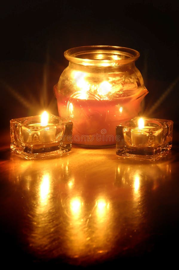 Glowing Candles stock photo. Image of orange, candlelight 9831974