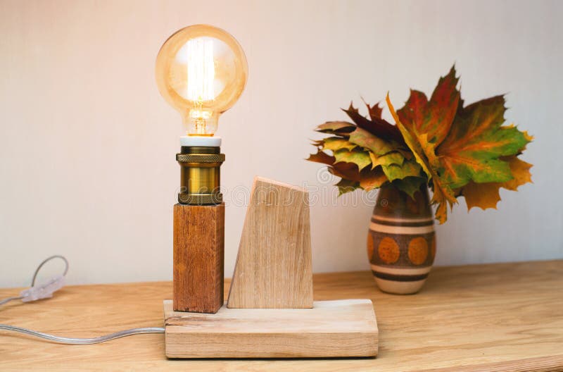 Glowing Edison bulb table lamp royalty free stock photo