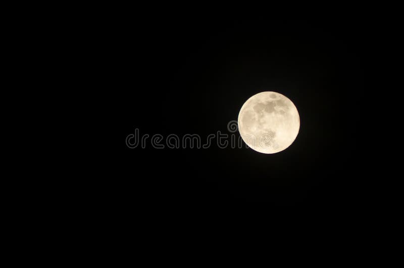 Glowing full moon with plenty of space for text