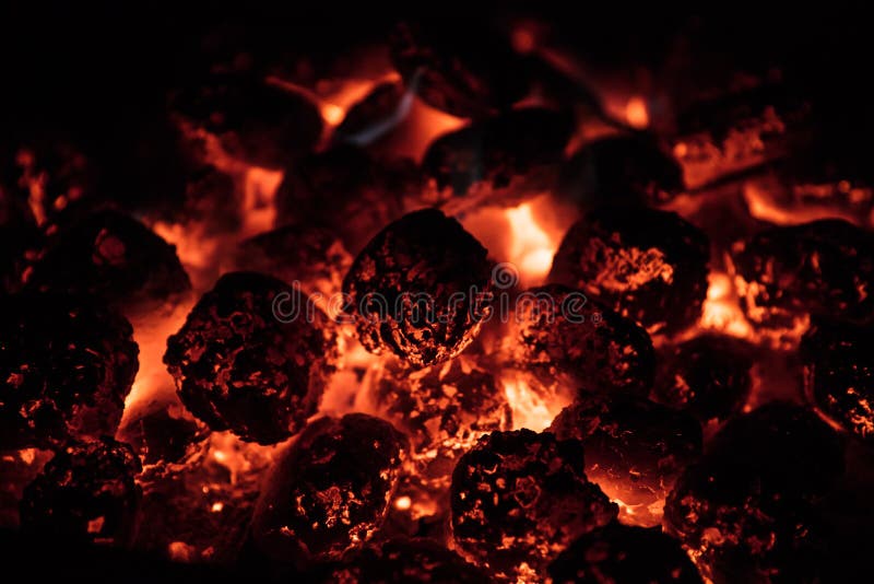 Glowing Hot Charcoal Briquettes on garden grill, close-Up, royalty free stock photography Glowing Hot Charcoal Briquettes on garden grill, close-Up, royalty free stock photography