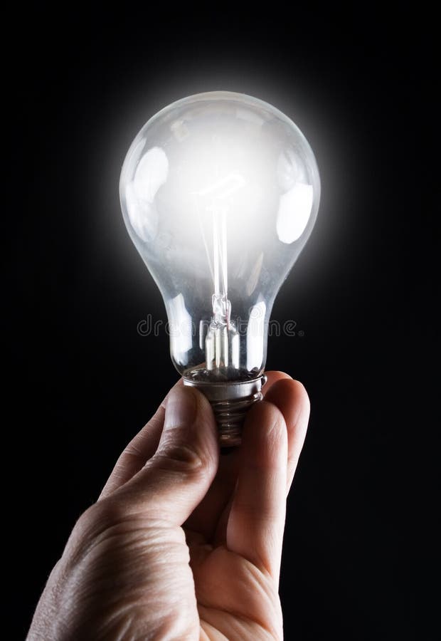 Light bulb and salt shaker stock photo. Image of light 67166454