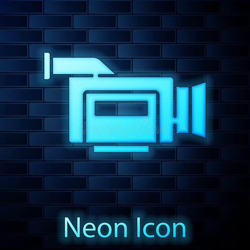 Glowing neon Cinema camera icon isolated on brick wall background. Video camera. Movie sign. Film projector. Vector.