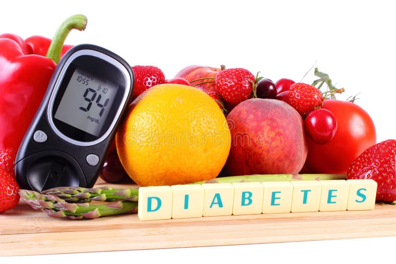 Glucometer avec des fruits et légumes, nutrition saine, diabète photos stock Glucometer avec des fruits et légumes, nutrition saine, diabète photos stock