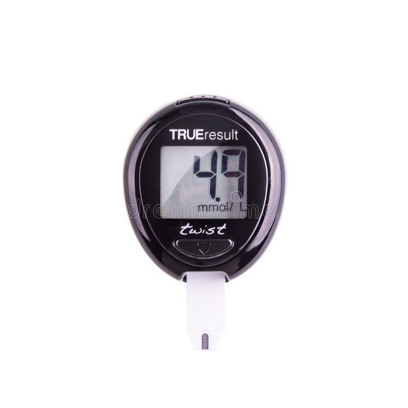 Glucometer for checking blood sugar levels on a white background stock photos Glucometer for checking blood sugar levels on a white background stock photos
