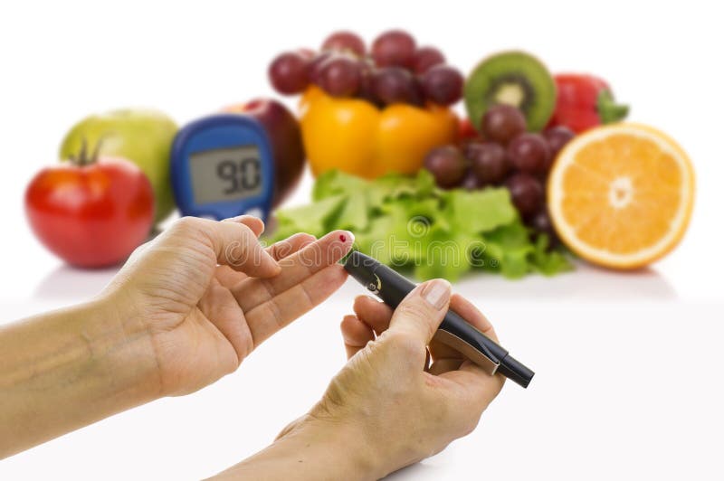 Glucometer Para El Nivel De La Glucosa Y El Alimento Biológico Sano