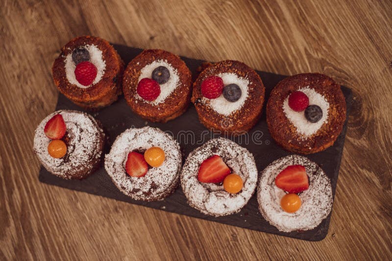Gluten-free Cakes Decorated with Berries. Healthy Food Concept Stock