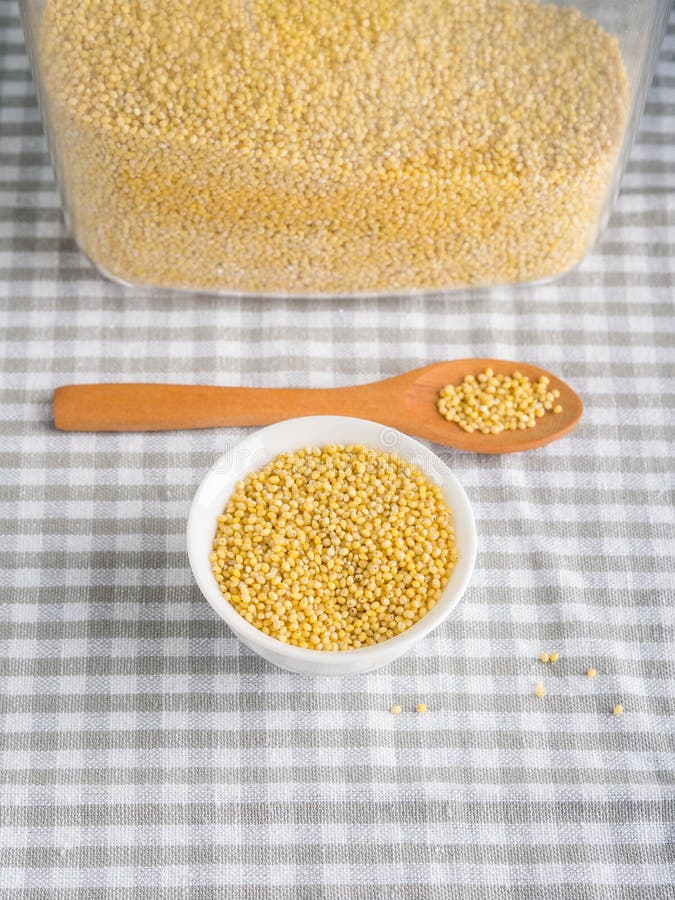Gluten Free Grain Millet in Bowl on Kitchen Table Stock Photo Image