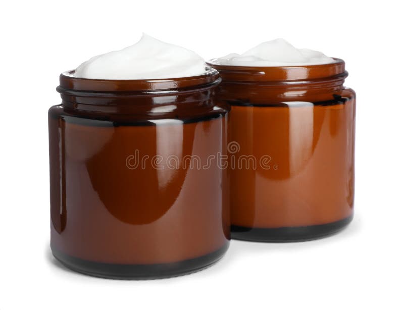 Gläser aus weißem Gesichtscreme lizenzfreie stockfotos