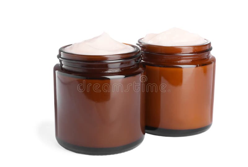 Gläser aus weißem Gesichtscreme stockfoto