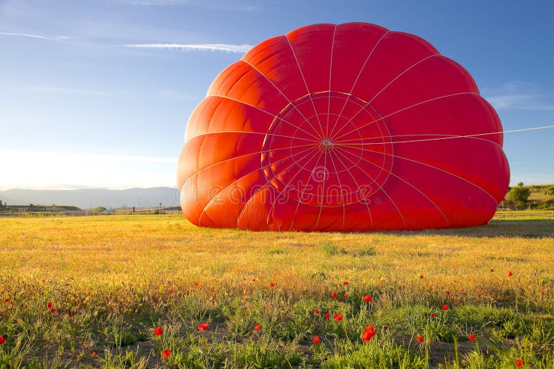 Glödhet luftballong som blåsas upp royaltyfri foto Glödhet luftballong som blåsas upp royaltyfri foto