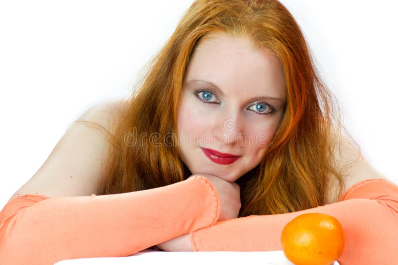 Glückliche Redheadfrau stockfoto