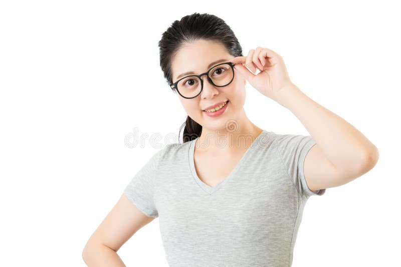 Glückliche schöne asiatische Frauen halten ihren neuen Gläser Eyewear lizenzfreie stockfotografie Glückliche schöne asiatische Frauen halten ihren neuen Gläser Eyewear lizenzfreie stockfotografie