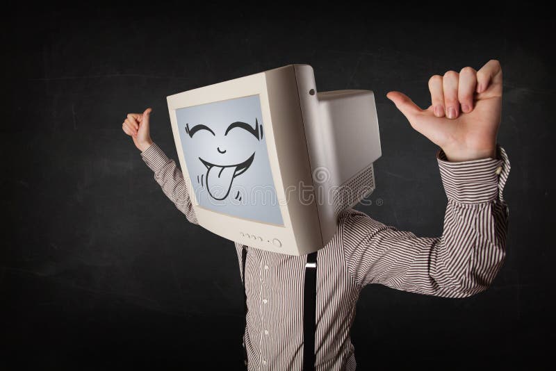 Glücklicher Geschäftsmann mit einem Computermonitor und einem smileygesicht stockfotografie Glücklicher Geschäftsmann mit einem Computermonitor und einem smileygesicht stockfotografie
