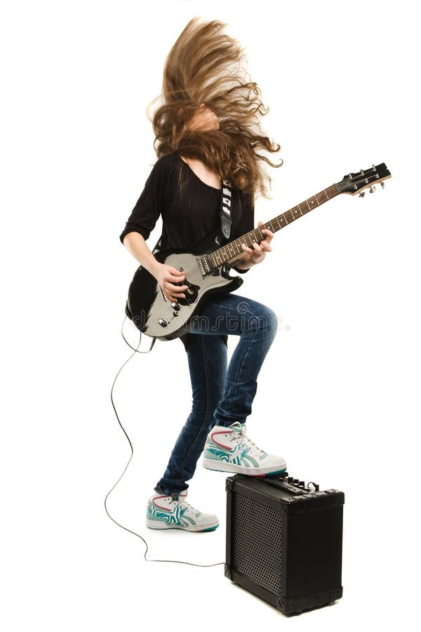 Glückliches Teenagermädchen spielt Gitarre lizenzfreies stockbild
