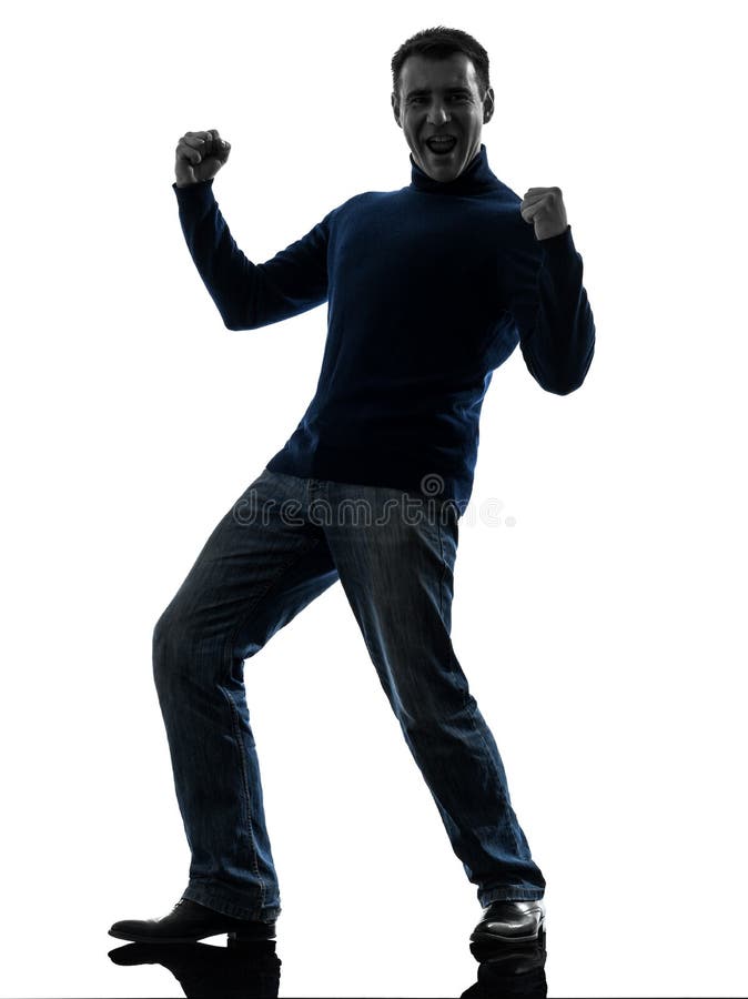 Glückliches starkes siegreiches Schattenbild des Mannes in voller Länge lizenzfreies stockbild Glückliches starkes siegreiches Schattenbild des Mannes in voller Länge lizenzfreies stockbild