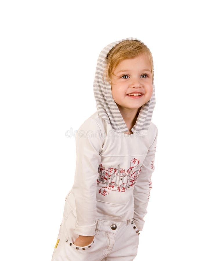 Glückliches Tragen des kleinen Mädchens des smiley weiße Jeans stockfotos Glückliches Tragen des kleinen Mädchens des smiley weiße Jeans stockfotos