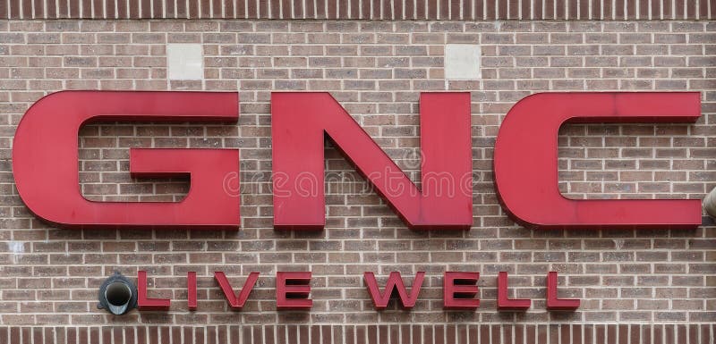 GNC, il segno di un rivenditore di salute-e-benessere fotografia stock GNC, il segno di un rivenditore di salute-e-benessere fotografia stock