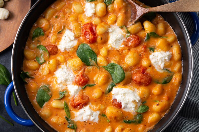 Gnocchi in Creamy Tomato Sauce with Baby Spinach and Melted Mozzarella