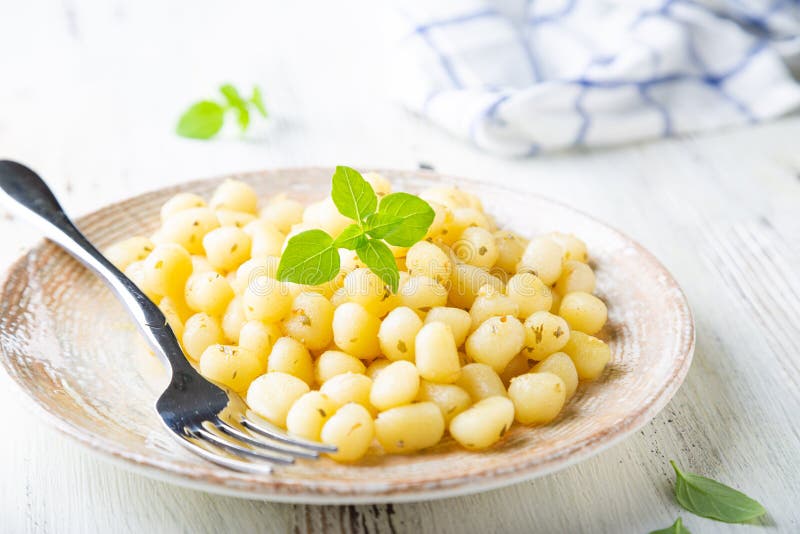 Gnocchi With Olive Oil, Garlic And Basil Stock Photo - Image Of Italian ...