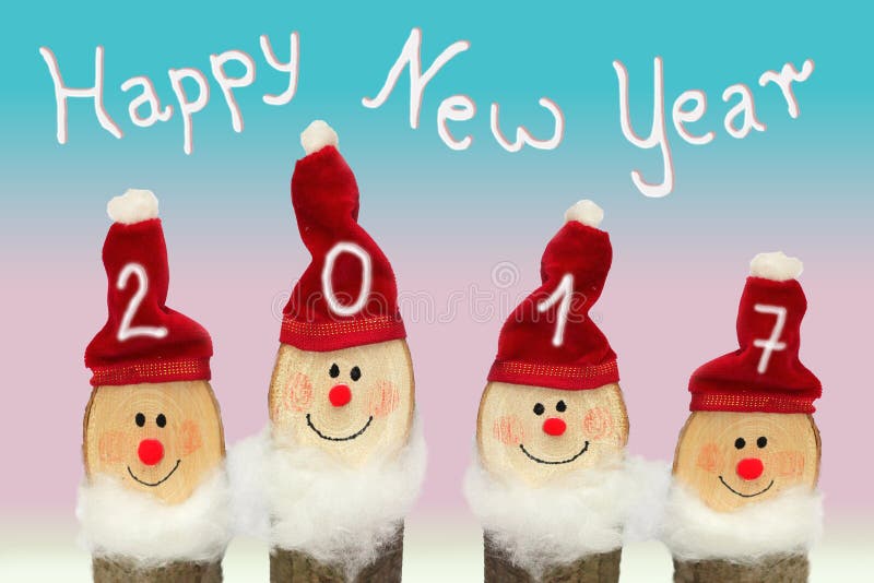Gnomos de la Feliz Año Nuevo 2017 - cuatro con la cara sonriente foto de archivo Gnomos de la Feliz Año Nuevo 2017 - cuatro con la cara sonriente foto de archivo