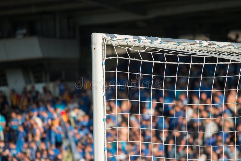 Goal post with soccer fans stock photo. Image of crowd 56776136