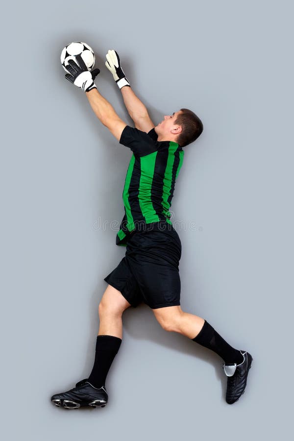 Caucasian Soccer Player Goalkeeper Man Catching Ball Silhouette Stock
