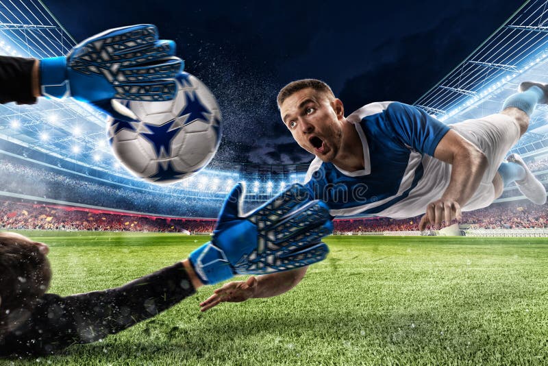 Goalkeeper catches the ball in the stadium stock photo Goalkeeper catches the ball in the stadium stock photo