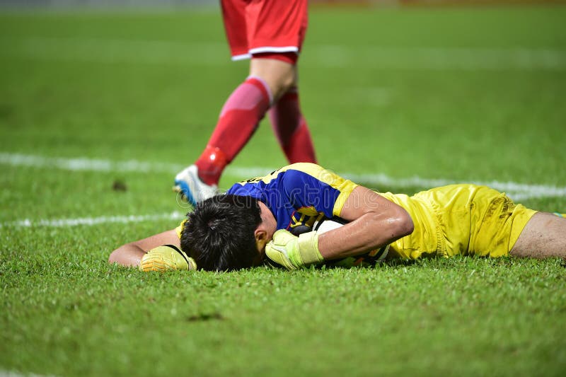 Boy Lying On Floor With Soccer Ball Stock Photo Image of looking