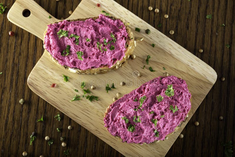 Goat Cream Cheese Mixed with Beet Spreaded on Bread Stock Photo Image