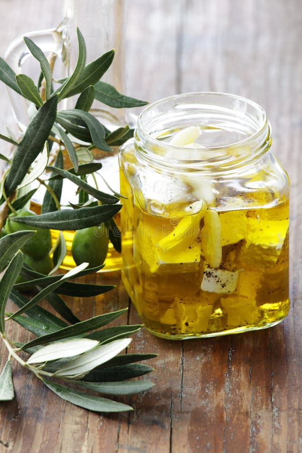 Goat s cheese in olive oil stock image. Image of cuisine 11282519