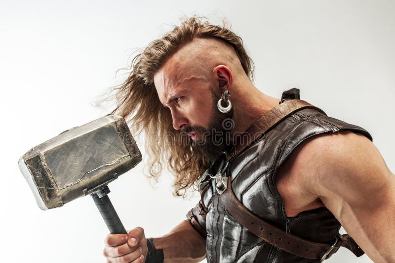 Man in cosplaying Thor isolated on white studio background