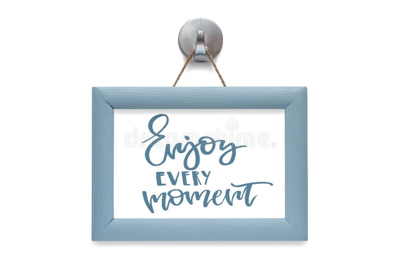 Goda di ogni momento Calligrafia moderna Citazione motivazionale blu fotografie stock Goda di ogni momento Calligrafia moderna Citazione motivazionale blu fotografie stock